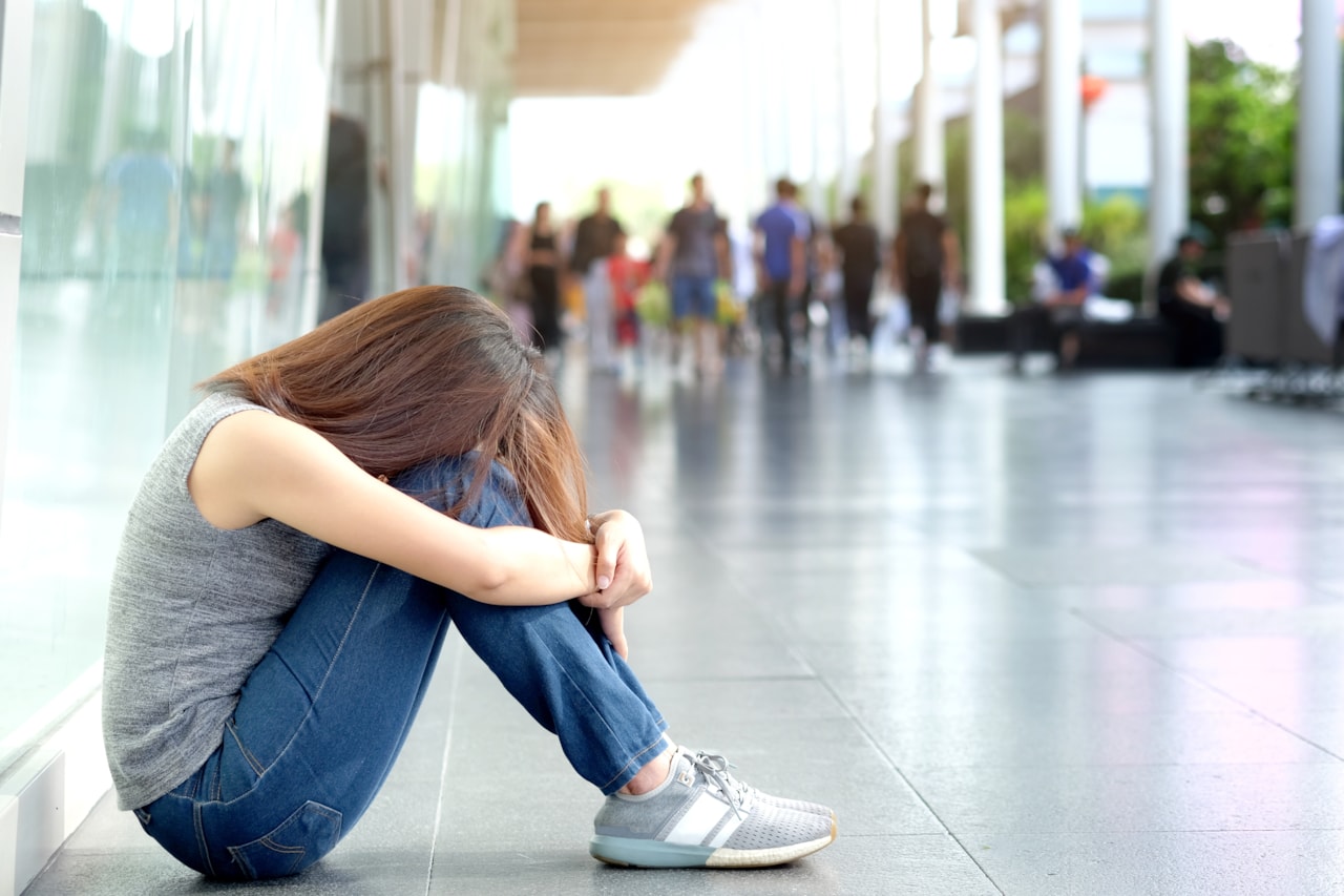 Woman alone - shutterstock_722937463